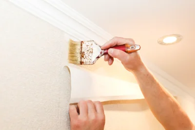 Pose de papier peint à Onoz — revêtements muraux et toiles de verre